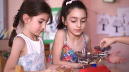 Elene and Anastasia from Georgia solve the conflict during the kindergarten game at the negotiating table: "We are good friends."